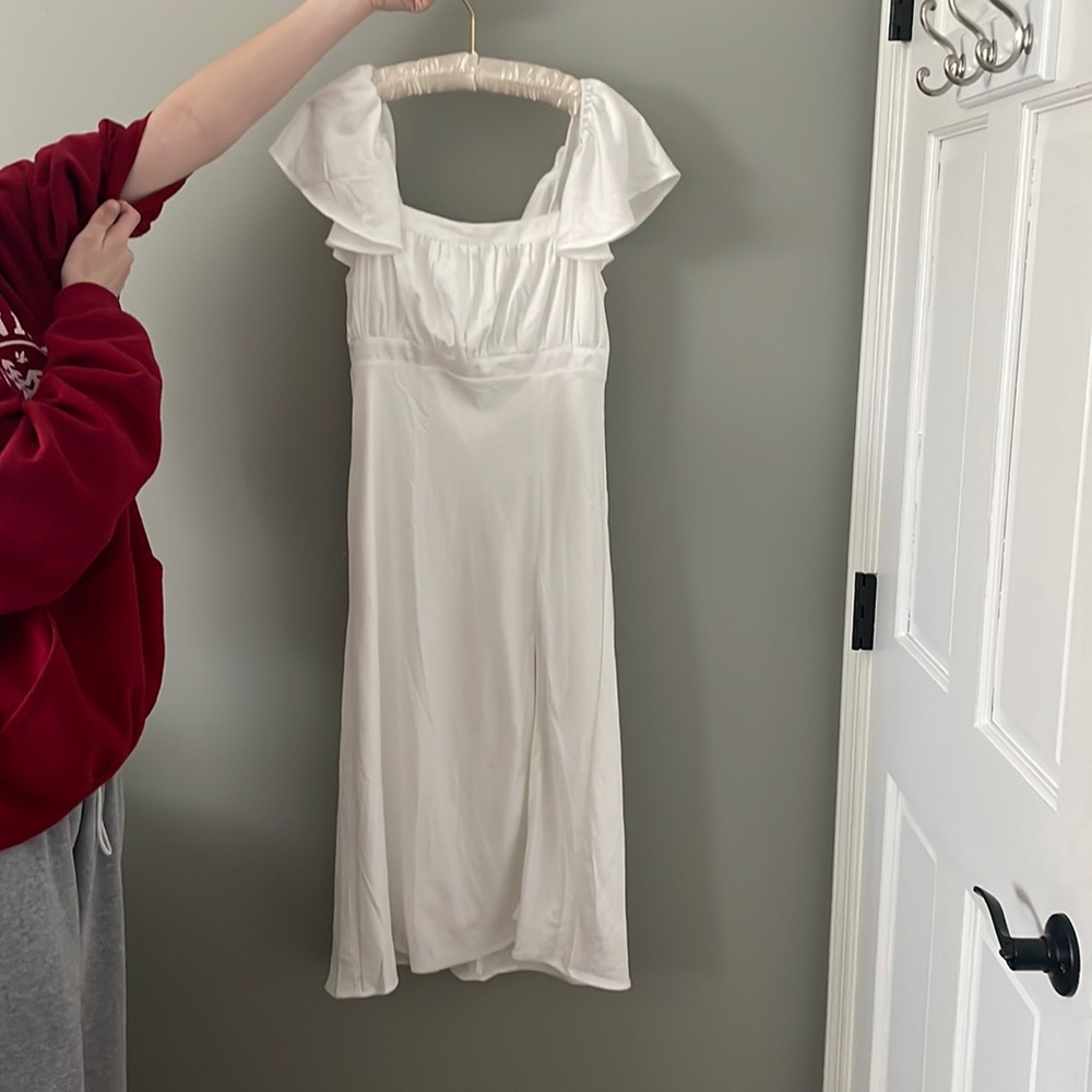 White dress, chin length with slit in the front, medium, silk like fabric